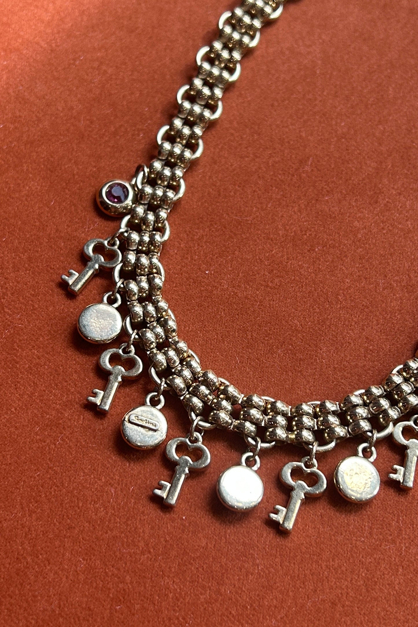 Sodini Gold-Tone Charm Necklace with Pink Stones