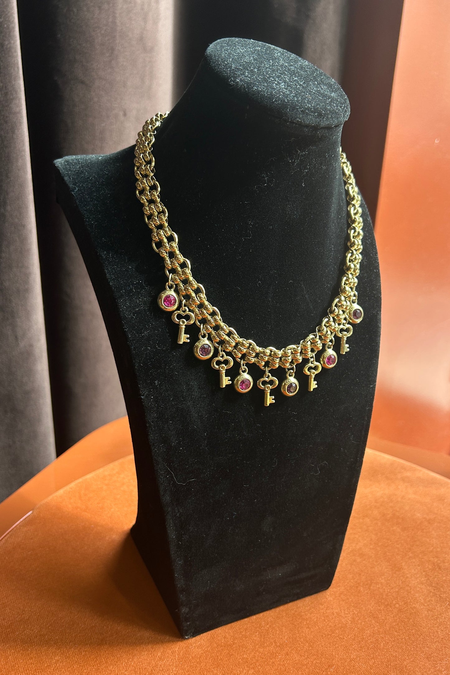 Sodini Gold-Tone Charm Necklace with Pink Stones