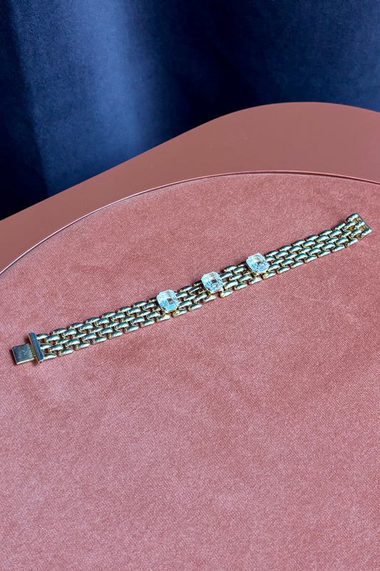 Watchband-Style Gold Bracelet with Faceted White Stones